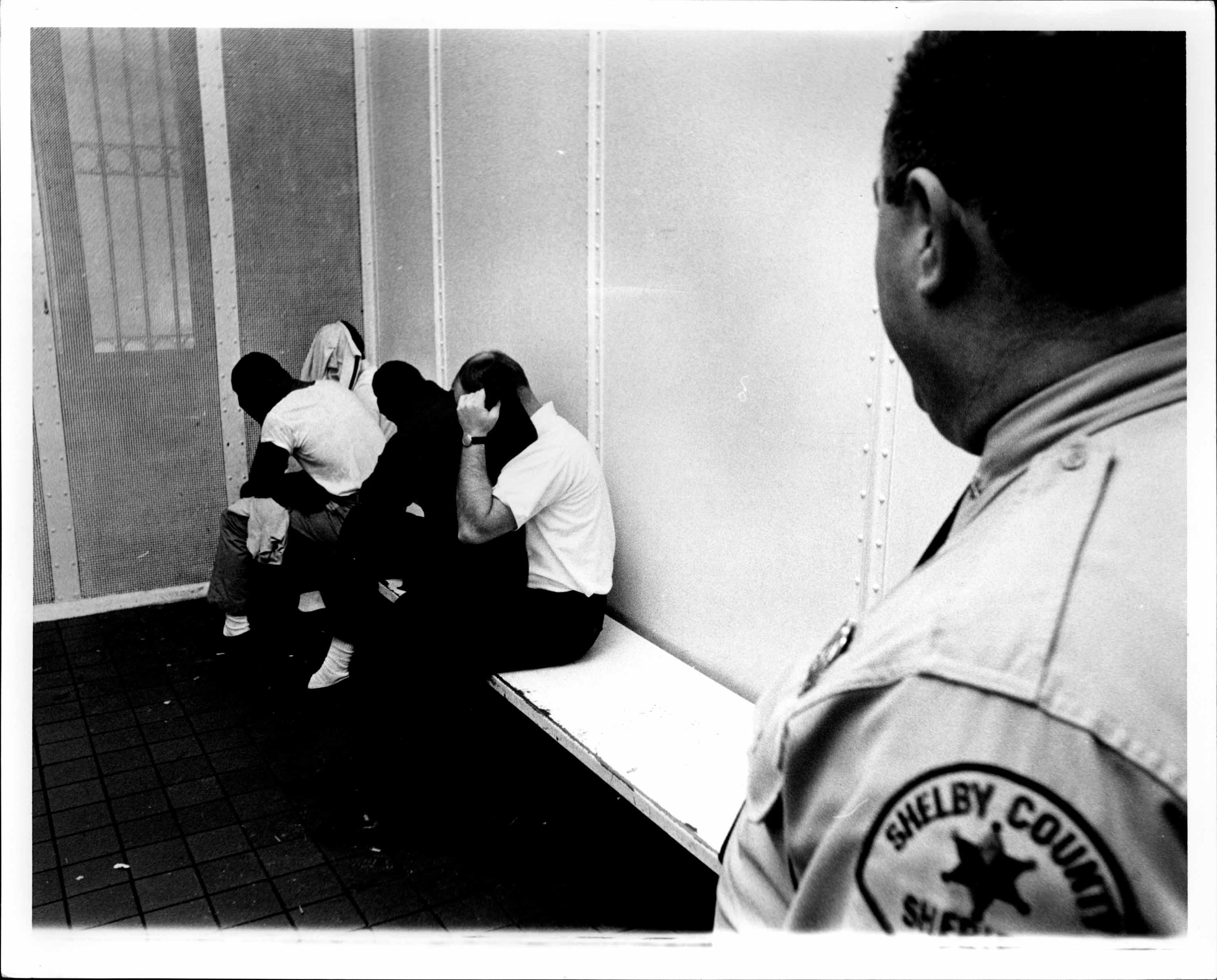 40holding cell with prisoners.jpg